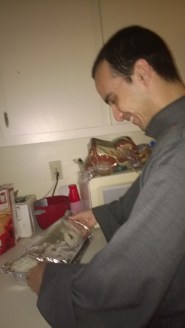 Getting the lasgna ready for the oven.